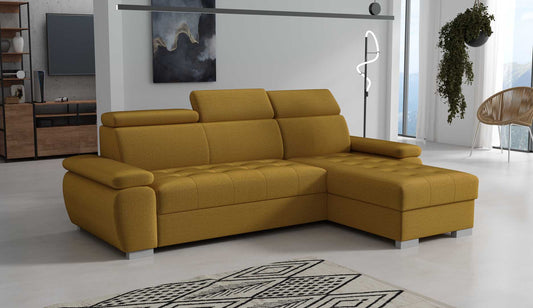 A yellow corner sofa with a sleeping function and storage space, positioned in a bright living room setting.