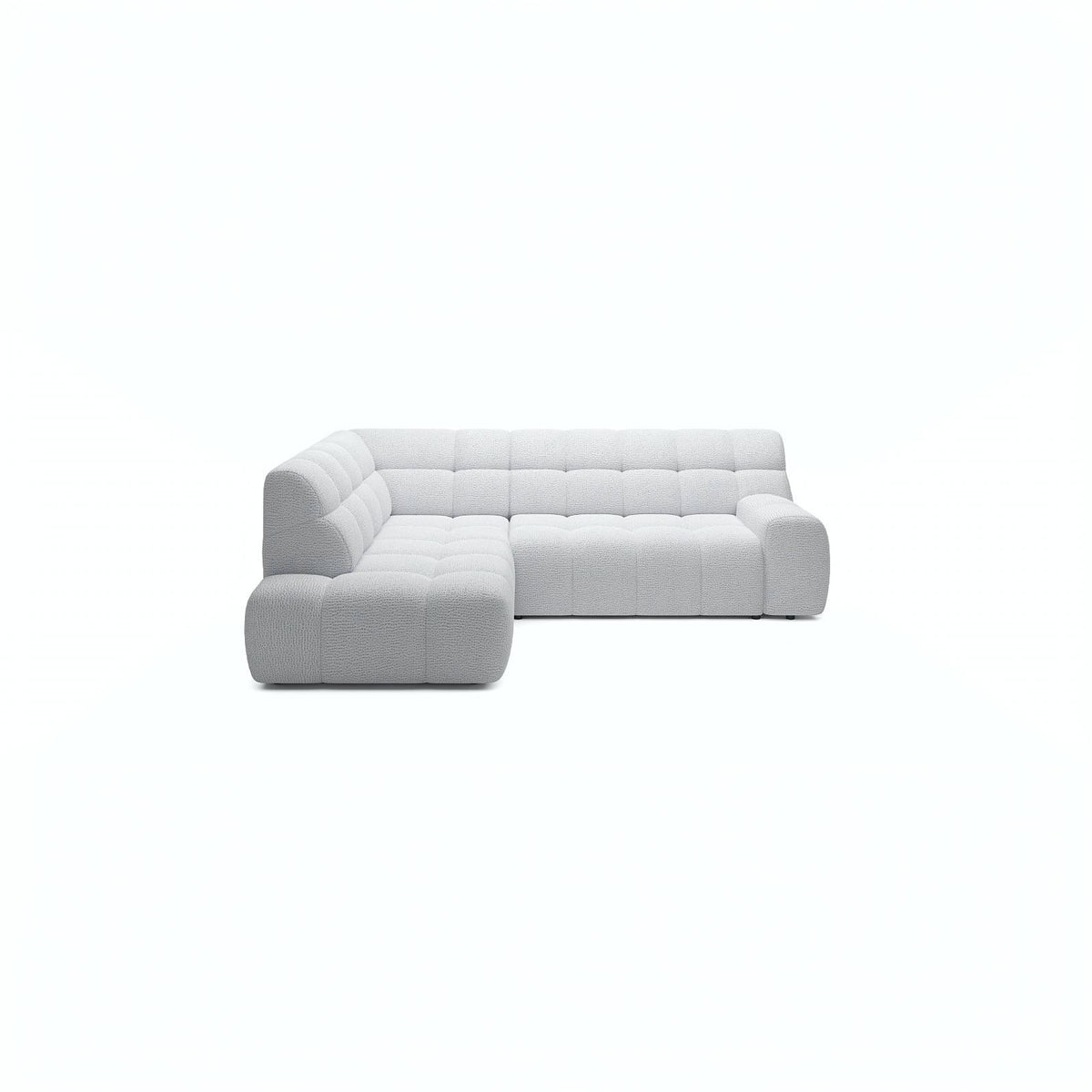 A light gray tufted modular sectional sofa with a left-facing chaise, shown from a front-facing perspective on a solid white background.