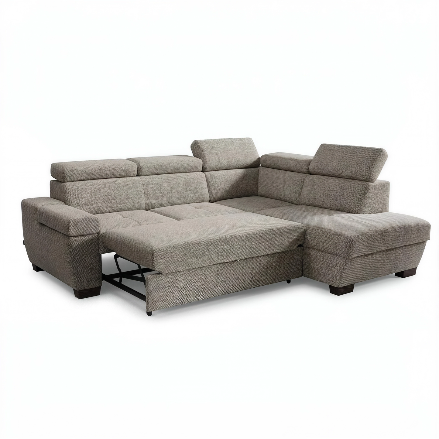 A beige upholstered sectional sofa with a chaise lounge and reclining seat section, shown on a plain white background.
