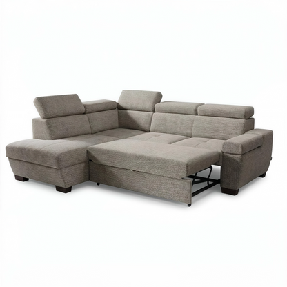 A beige fabric sectional sofa with a chaise lounge on the left and a reclining seat section, shown on a plain white background.